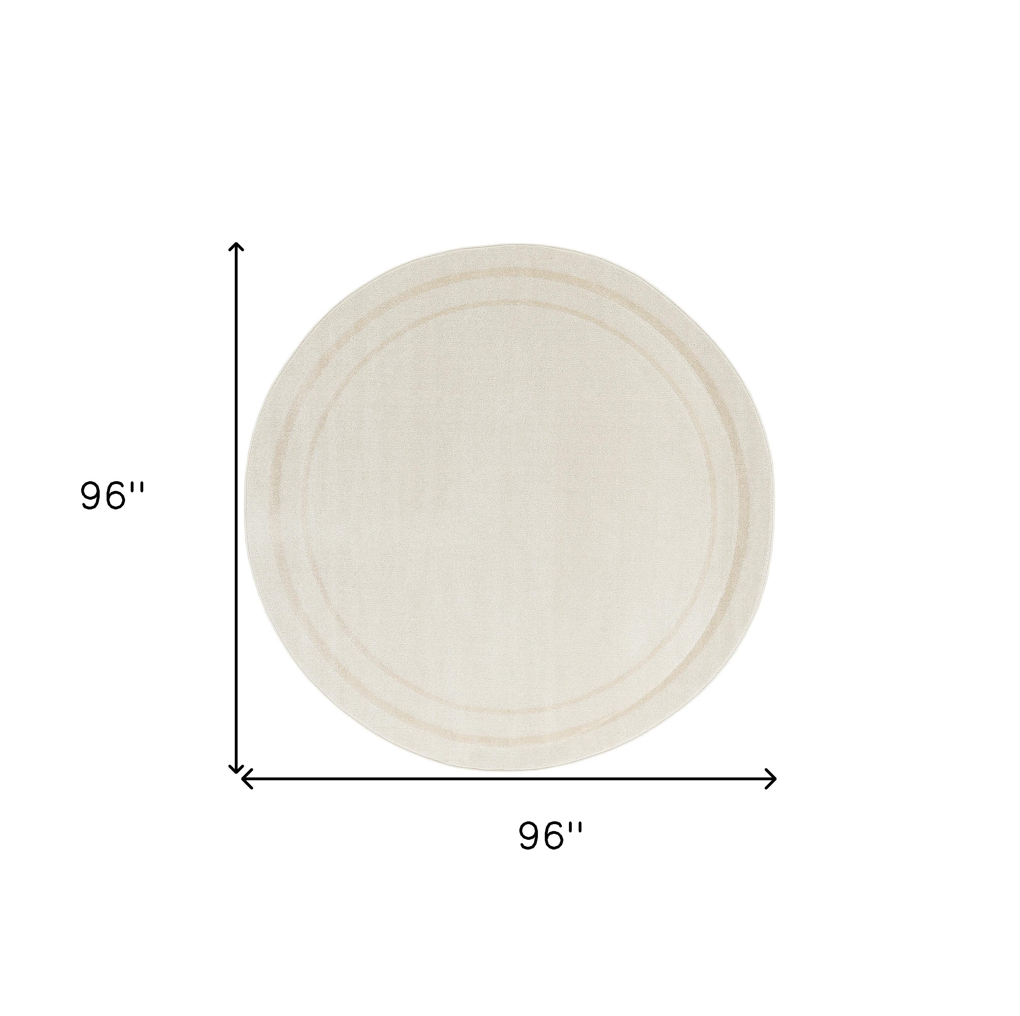 8' Ivory And Gold Round Indoor Outdoor Area Rug